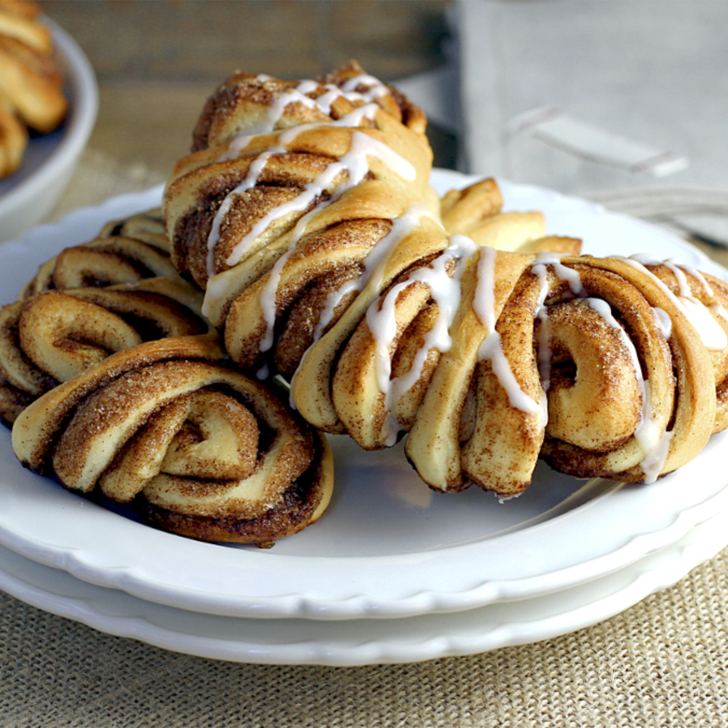 Closeup on a pile of bear claws on a porcelain plate